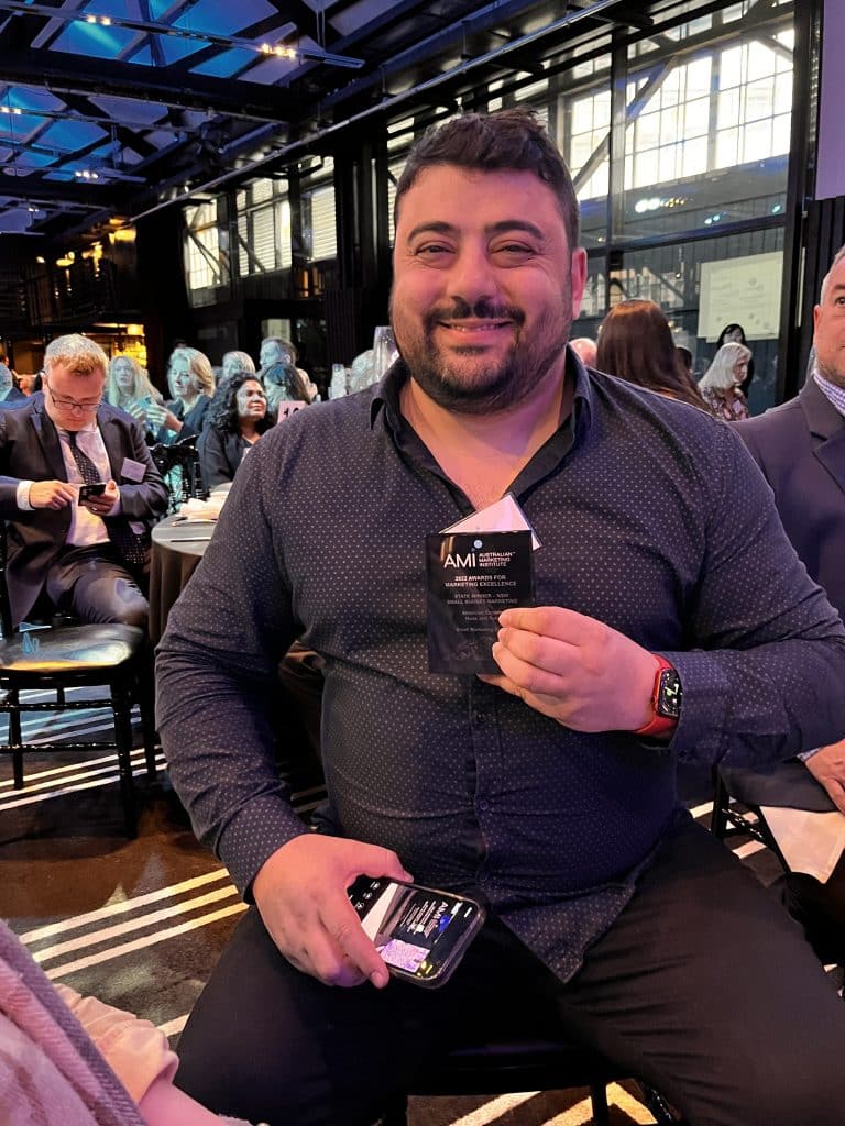 George with AMI award trophy